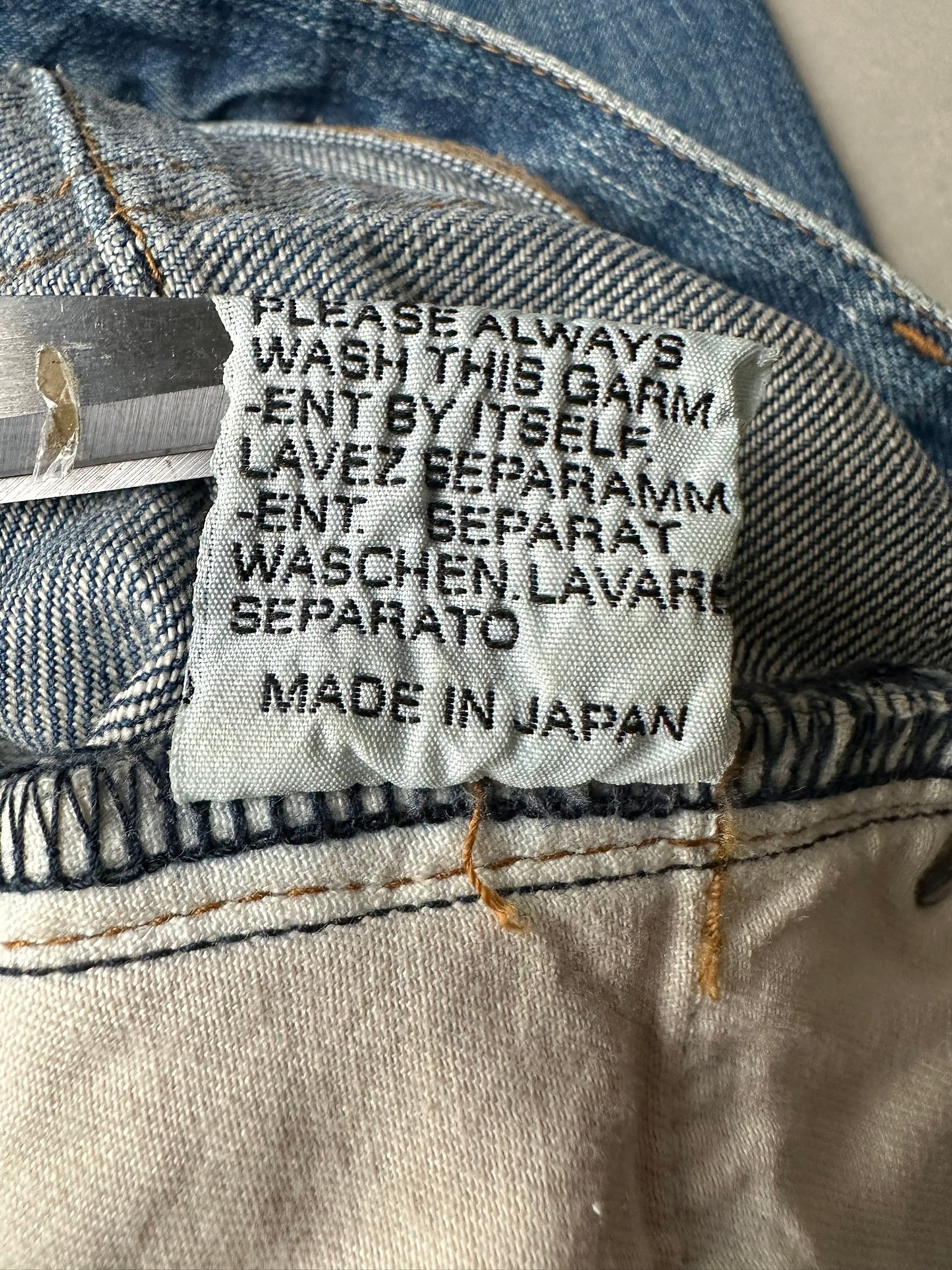 Dior Homme AW06 washed blue clawmark jeans