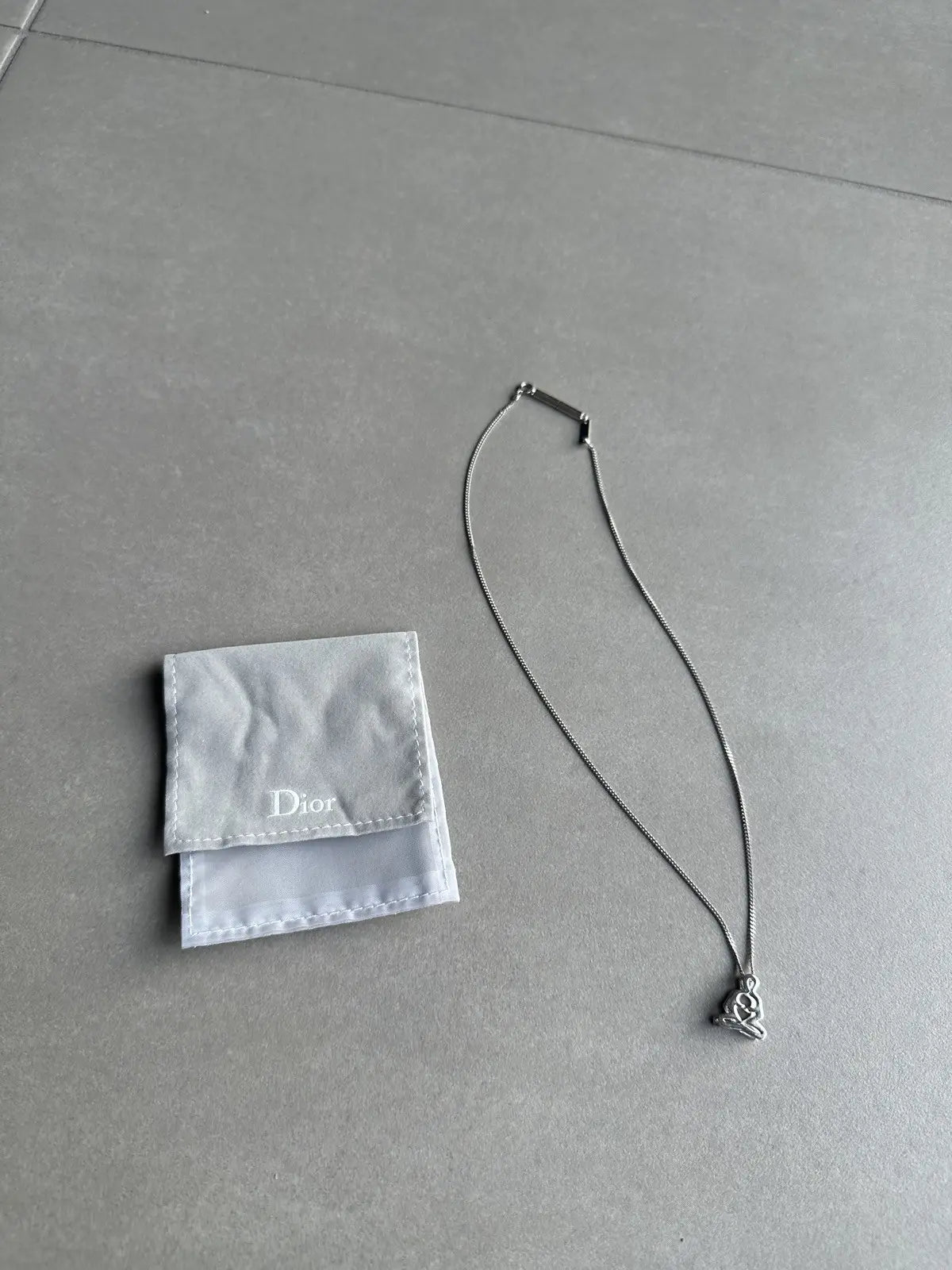 Dior homme SS03 “Follow me” Meditating figure necklace