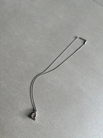 Dior homme SS03 “Follow me” Meditating figure necklace