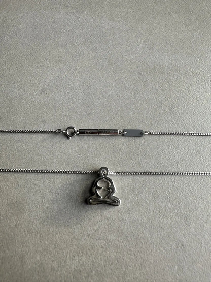 Dior homme SS03 “Follow me” Meditating figure necklace