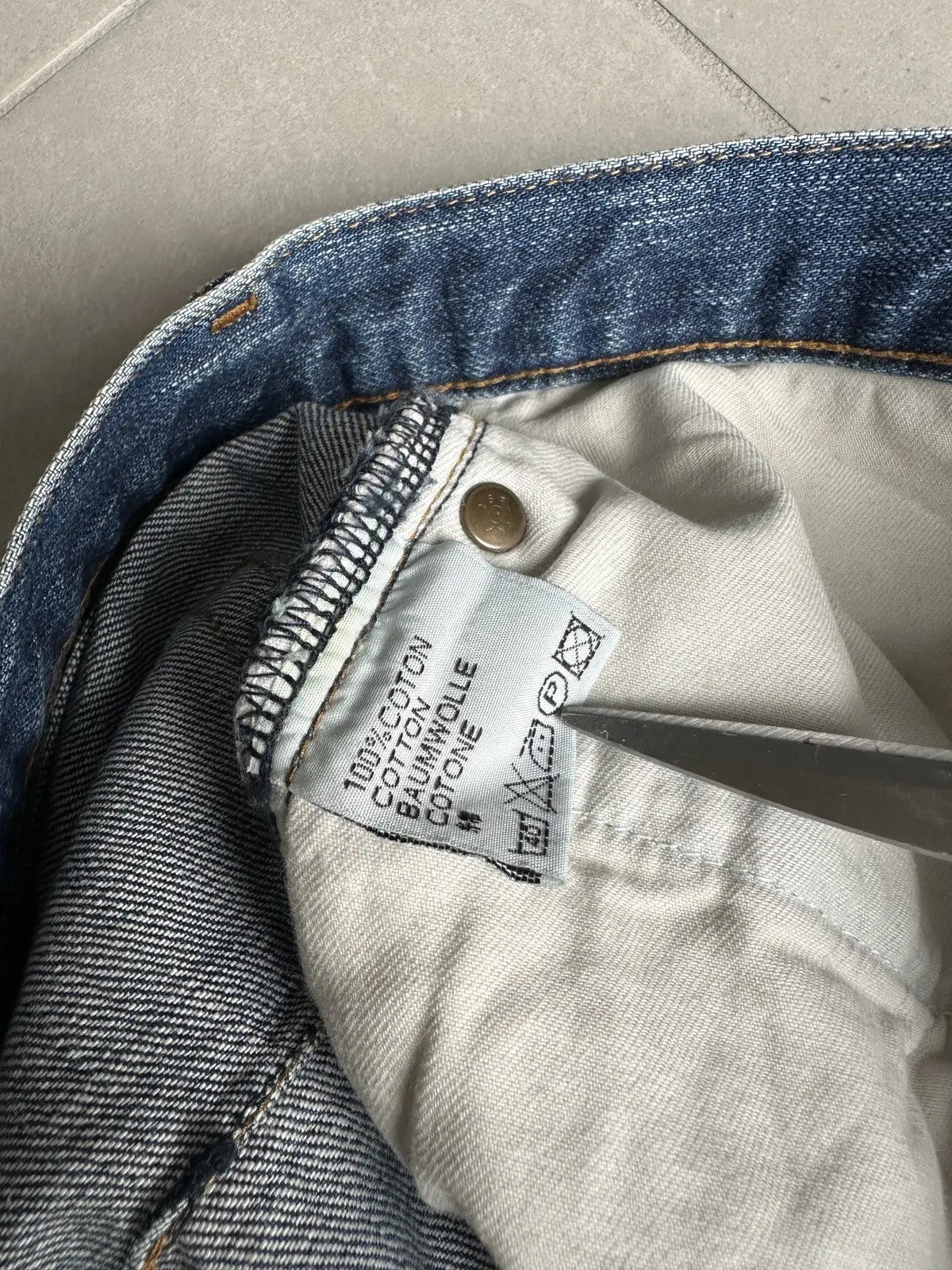 Dior Homme AW06 washed blue clawmark jeans