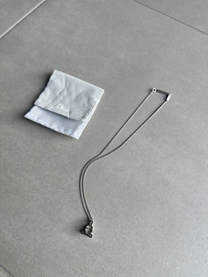 Dior homme SS03 “Follow me” Meditating figure necklace