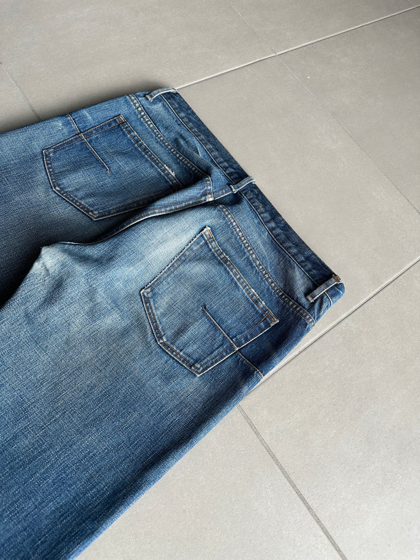 Dior Homme AW06 washed blue clawmark jeans