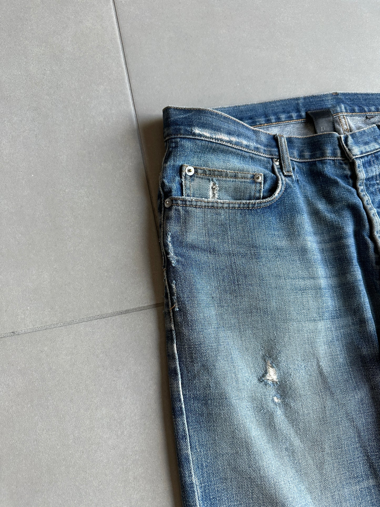 Dior homme AW04 “Victim of the crime” whiskered washed denim