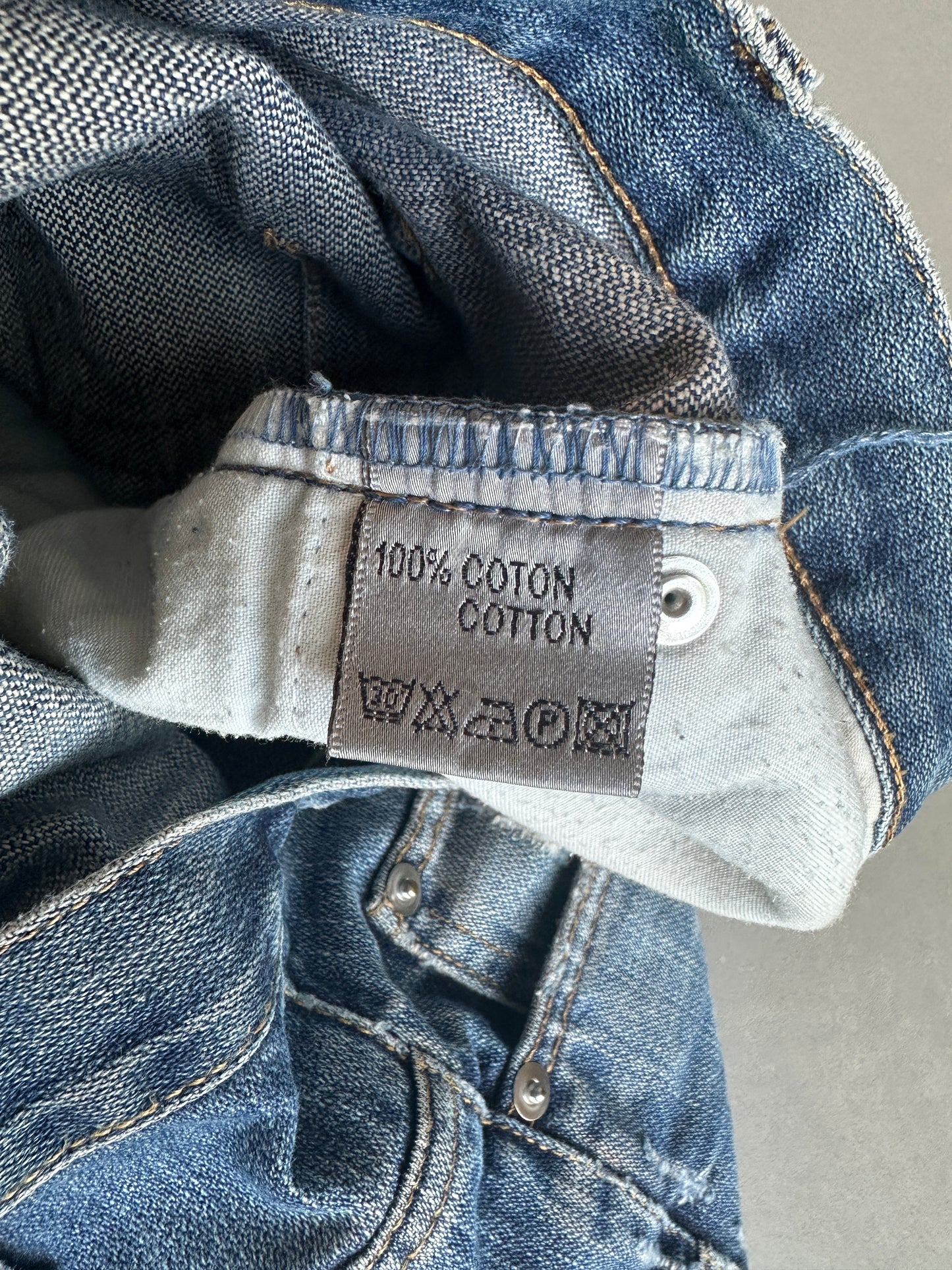 Dior homme AW04 “Victim of the crime” whiskered washed denim