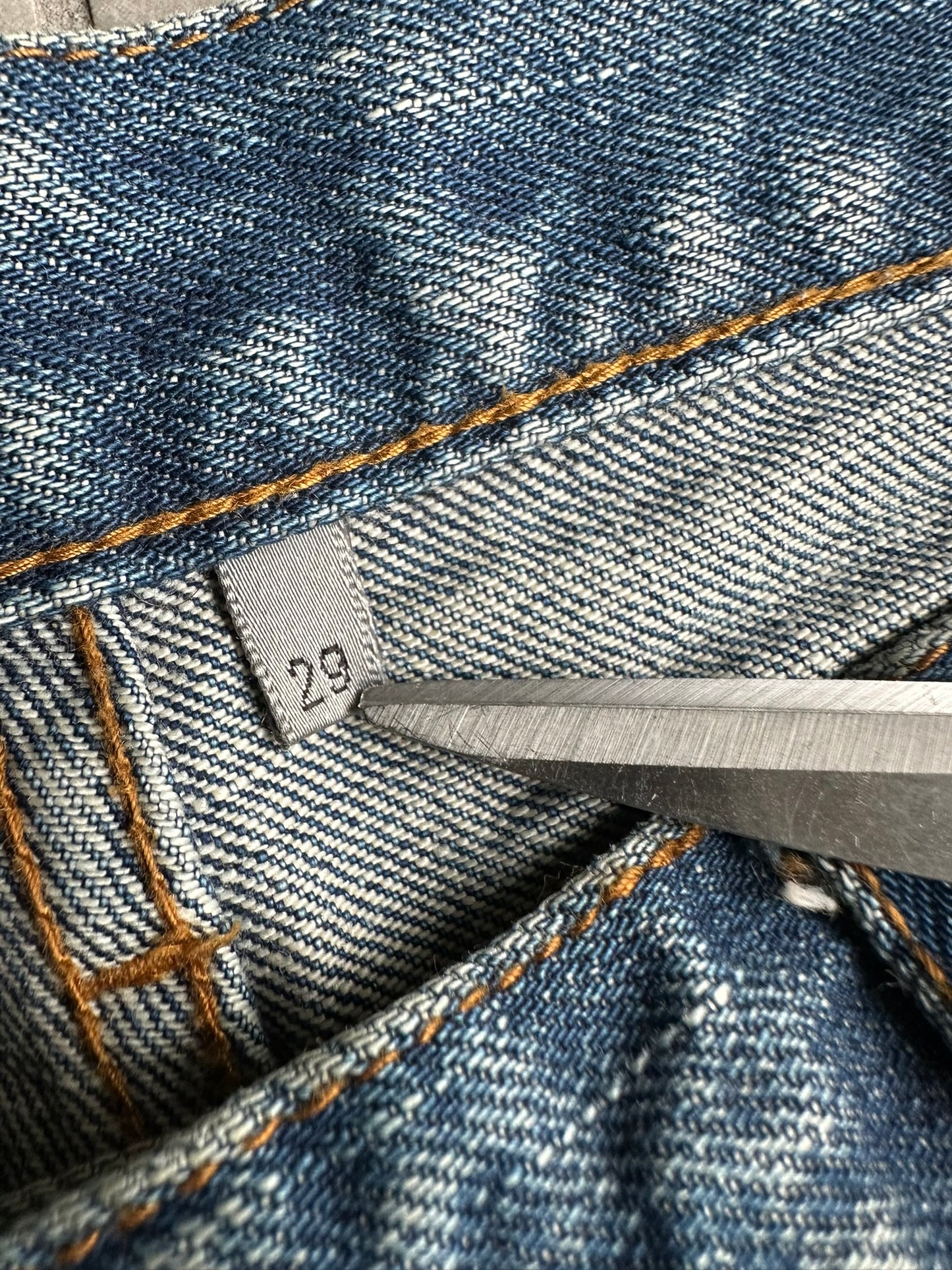 Dior Homme AW06 washed blue clawmark jeans