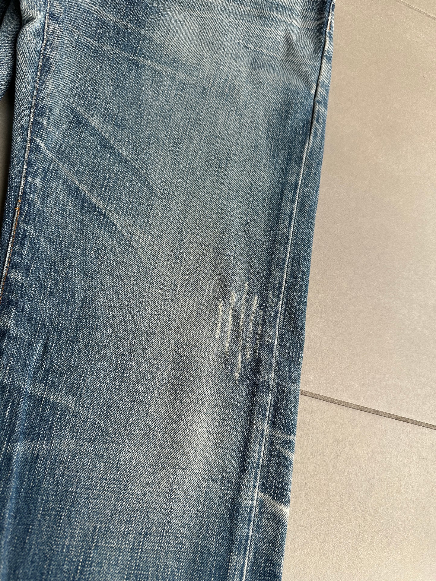 Dior Homme AW06 washed blue clawmark jeans