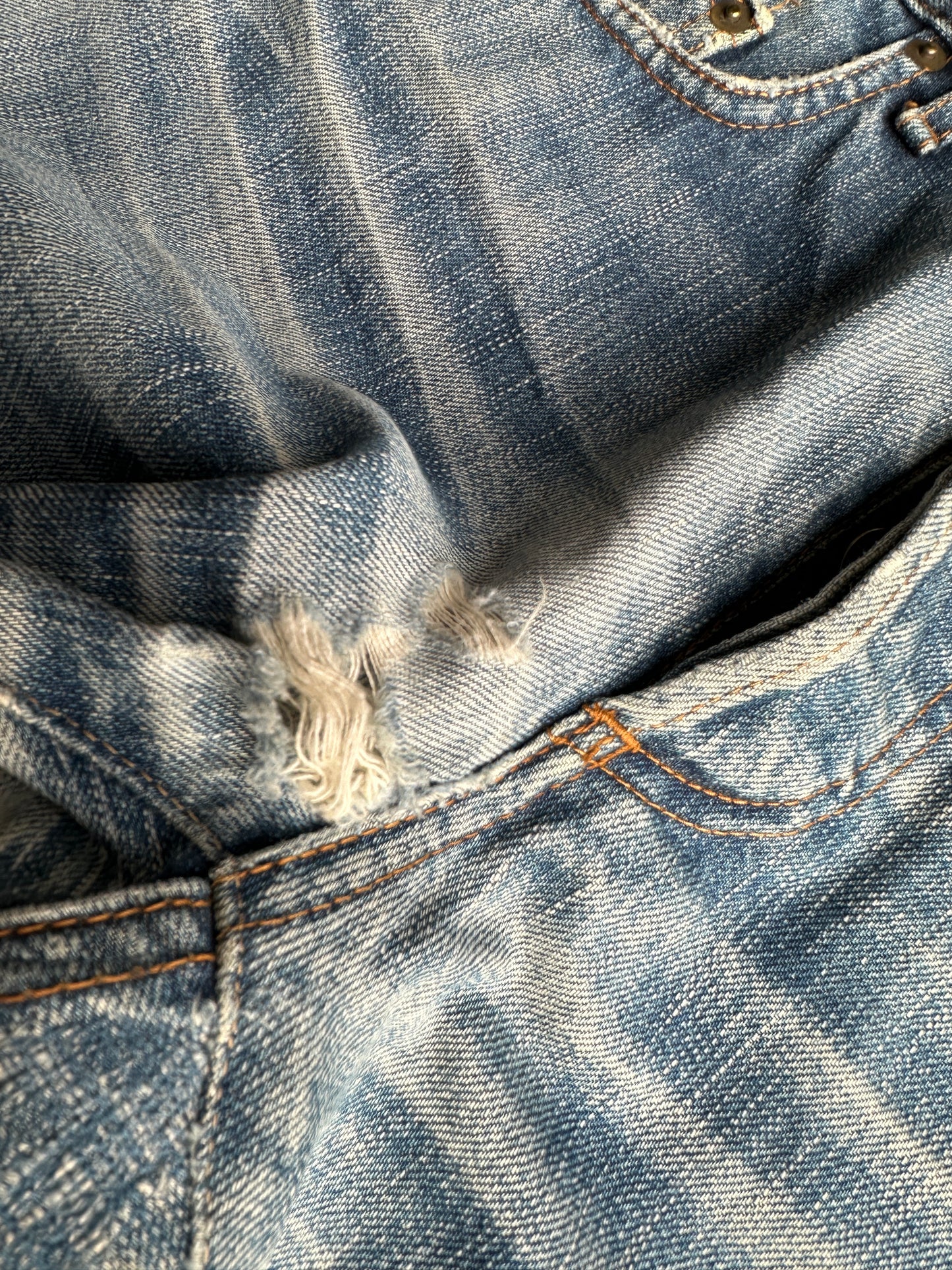 Dior Homme AW06 washed blue clawmark jeans