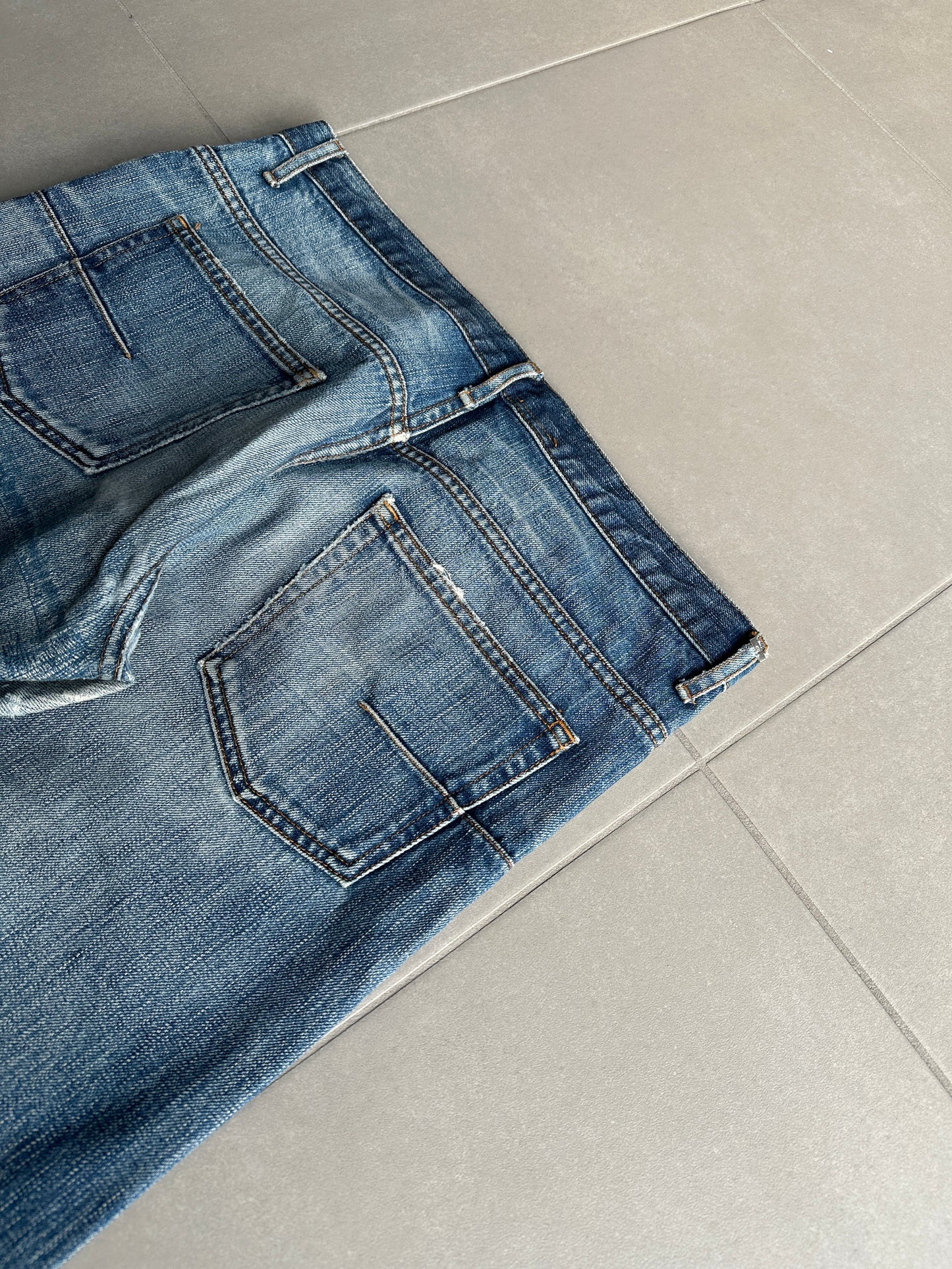 Dior Homme AW06 washed blue clawmark jeans