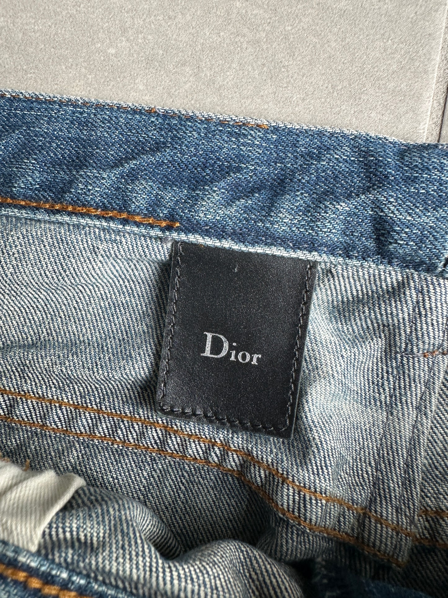 Dior Homme AW06 washed blue clawmark jeans