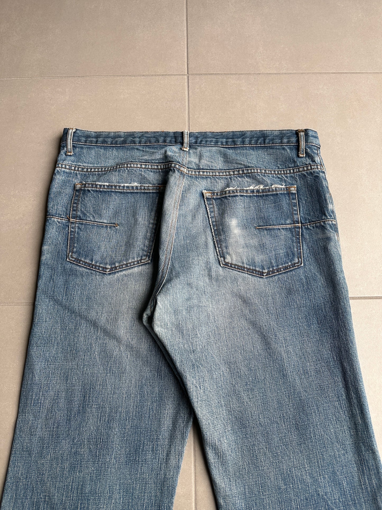 Dior Homme AW06 washed blue clawmark jeans