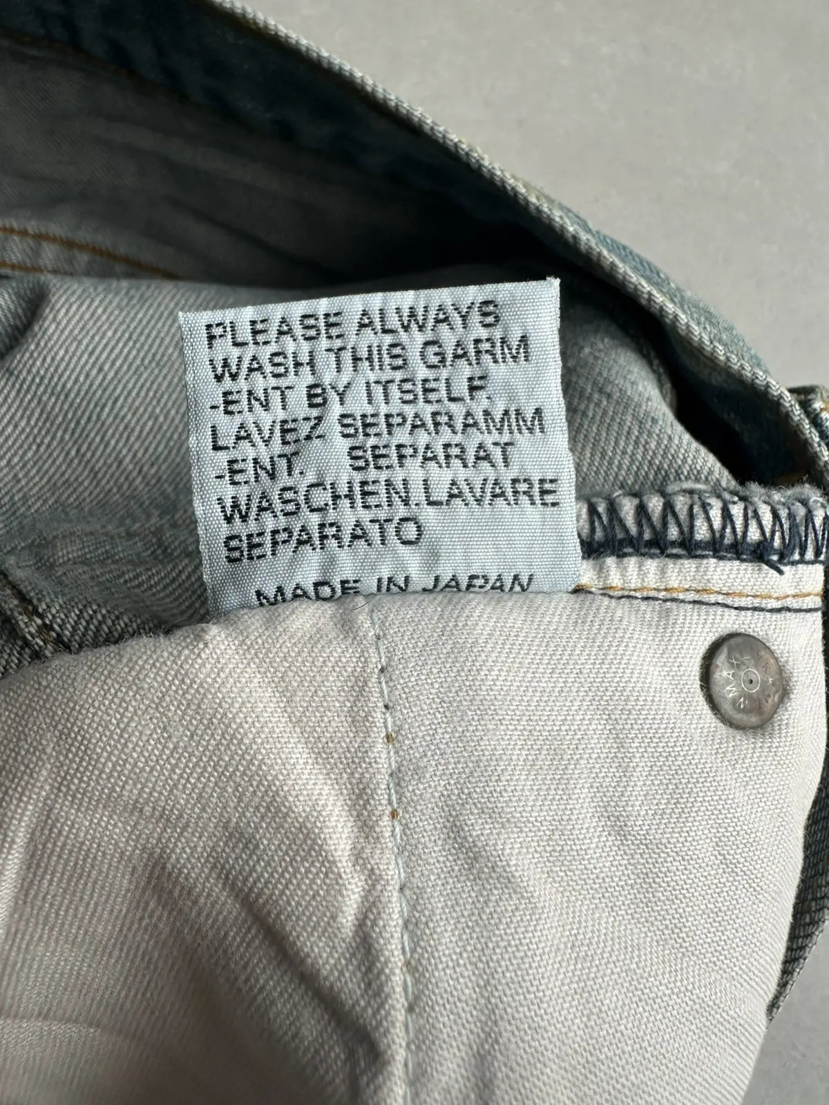 Dior Homme SS04 “Strip” waxed bleu claire clawmark denim