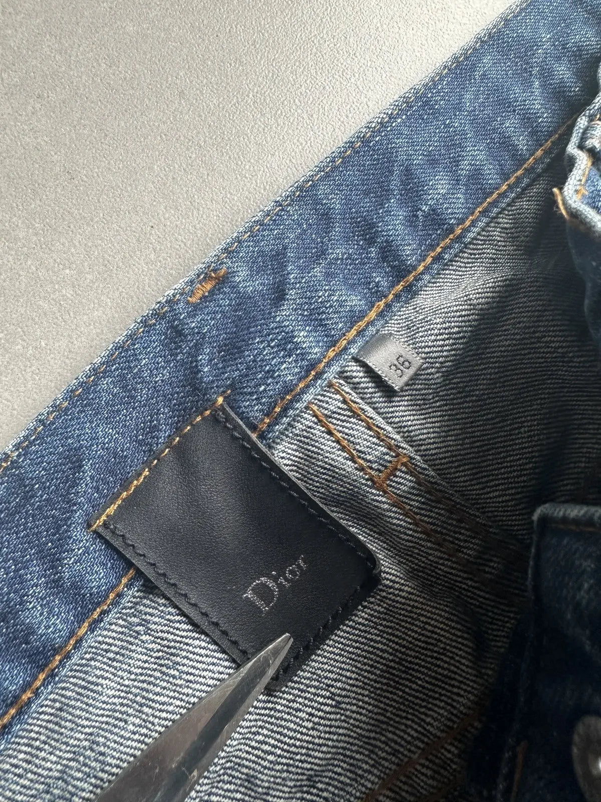 Dior Homme AW06 washed blue clawmark jeans